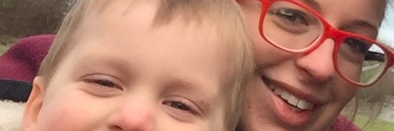 What It's Like Having Husband and Son With Von Hippel-Landau heidi leone and son holding a marshmallow