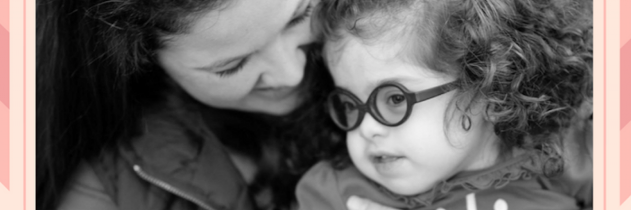 Organization Tools for Parents of Kids With Bohring-Opitz Syndrome mom holding little girl