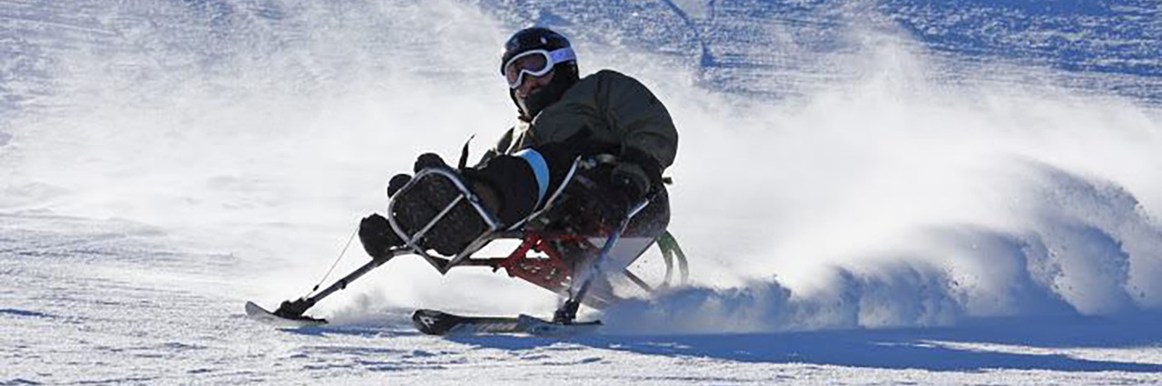 Embracing Challenges in My Life With Spina Bifida Enock skiing.