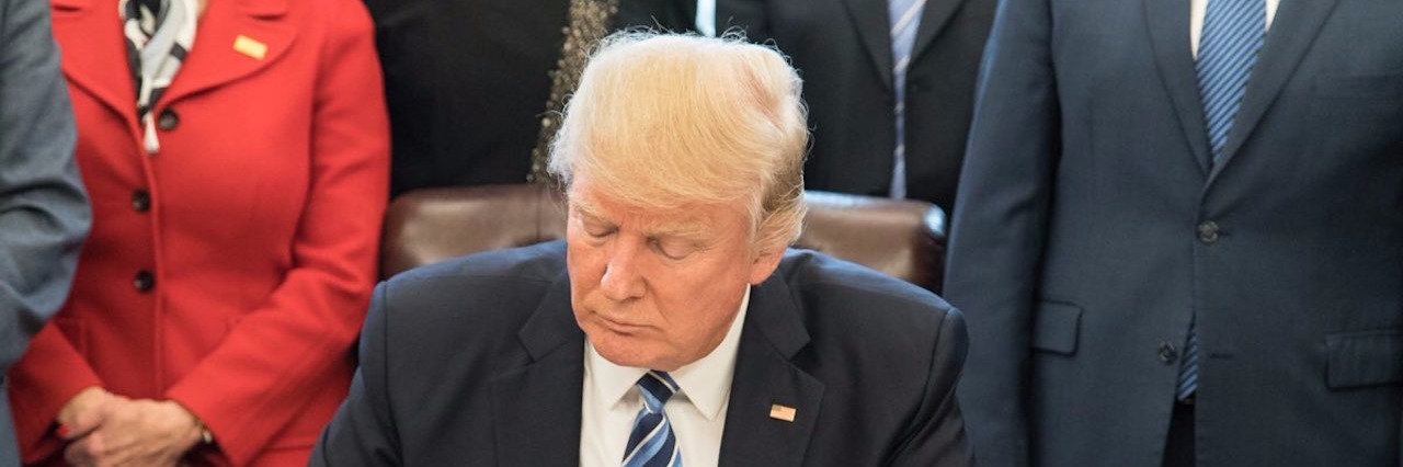 Redefining My Anxiety in the Age of Trump donald trump signing an executive order