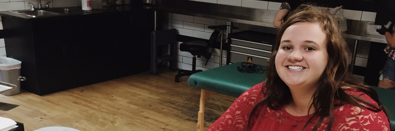 The Tattoo on My Foot That Helps Me Face ADHD, Anxiety and Depression woman getting a tattoo