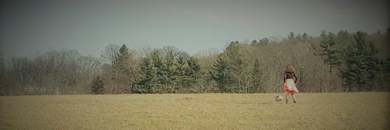 Explaining Depression and Suicide to Your Daughter The author's daughter in a field