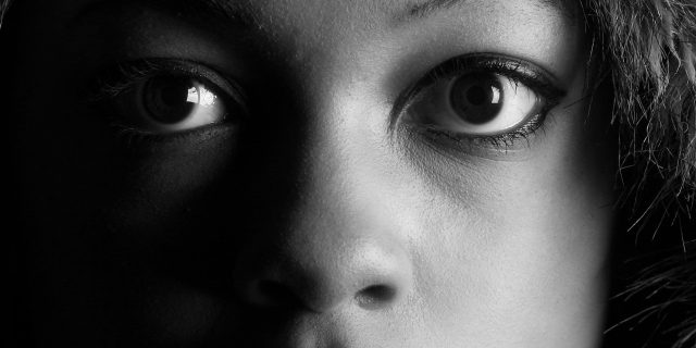 The Voice Within the Mind of Someone With an Addiction black woman monochrome looking at camera