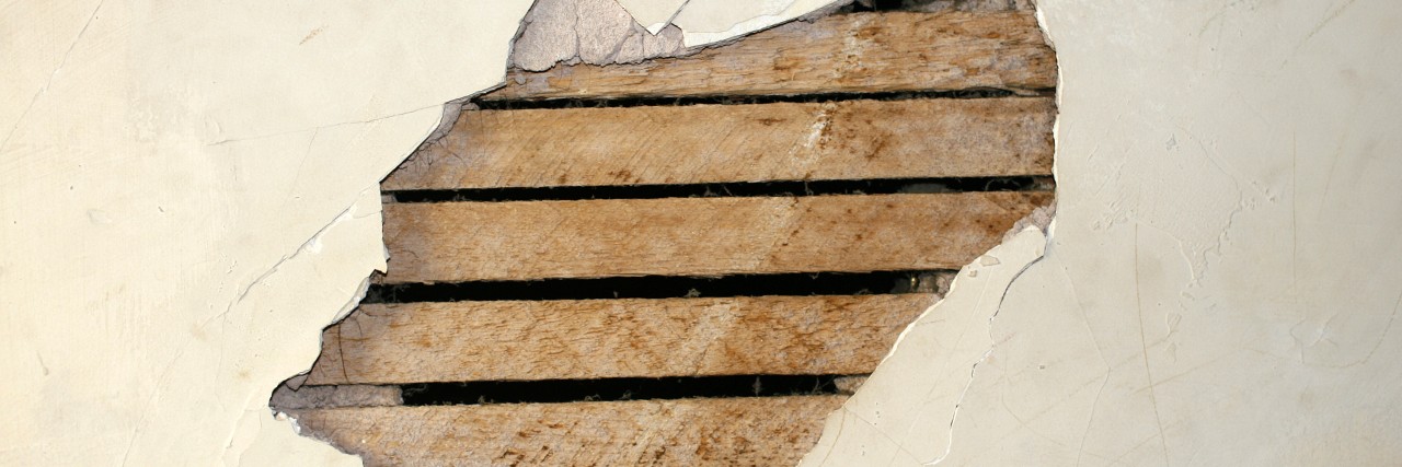 Medication Side Effects for Bipolar Disorder: Asking for Help Large hole in an antique plaster wall.