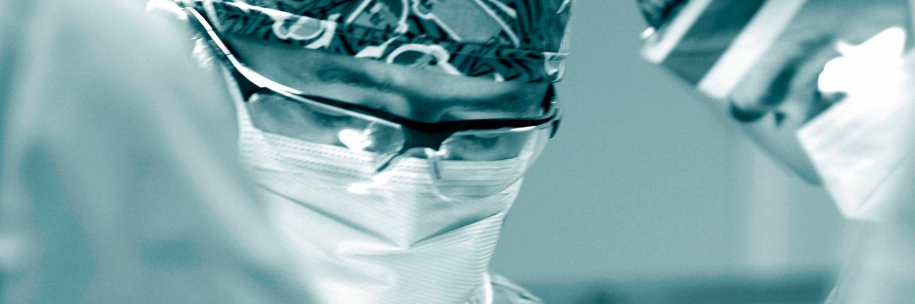 To My Life-Saving Surgeon, Who Immigrated From Iran Surgeons operating on patient in OR.