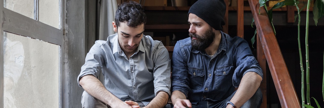 A Letter of Thanks to Someone Who Understood My Eating Disorder Two men sitting on a steps