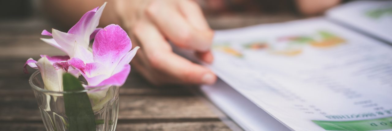 Eating Disorder Recovery Does Not Mean 'Clean Eating' Woman studying menu