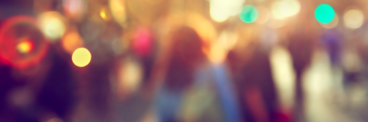 The Challenges I Face With Sensory Issues as an Autistic Person Blurred photo of people on city street