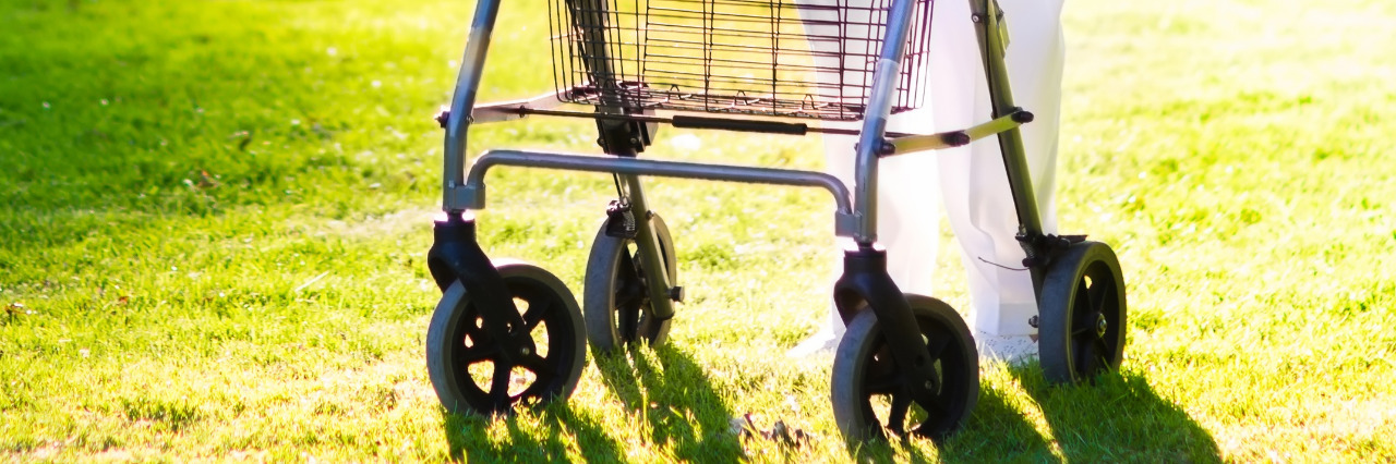 Overcoming Stigma About Using Mobility Devices Woman using a rolling walker.