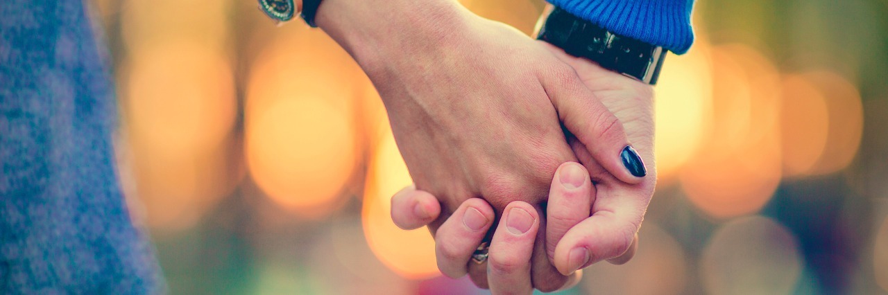 To My Partner: Thank You for Helping Me With My CRPS couple holding hands outdoors