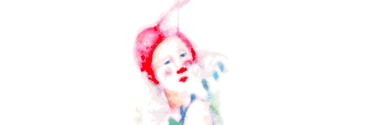 Using Humor as a Defense Mechanism for Depression young clown in colorful costume resting on a huge ball