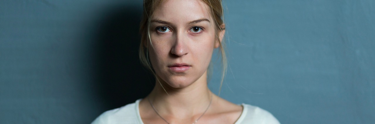 The Difference Between Depression and Sadness A woman looking sad