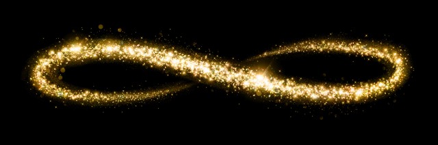 gold infinity sign made up of stars in the night sky