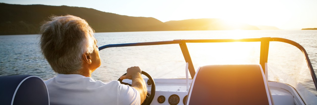 Depression: When No One Knows You're Asking for Help A man driving a boat
