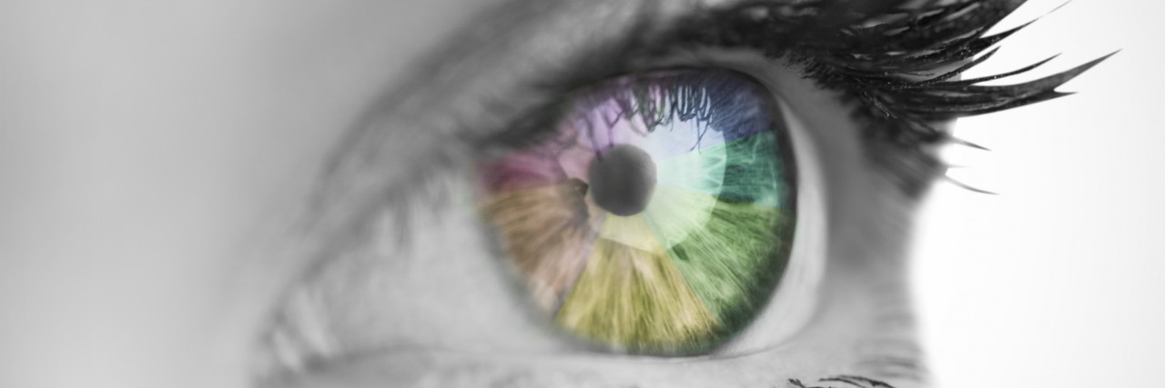 My Biggest Fears as Someone With Schizoid Personality Disorder Multi colored eye on grey face