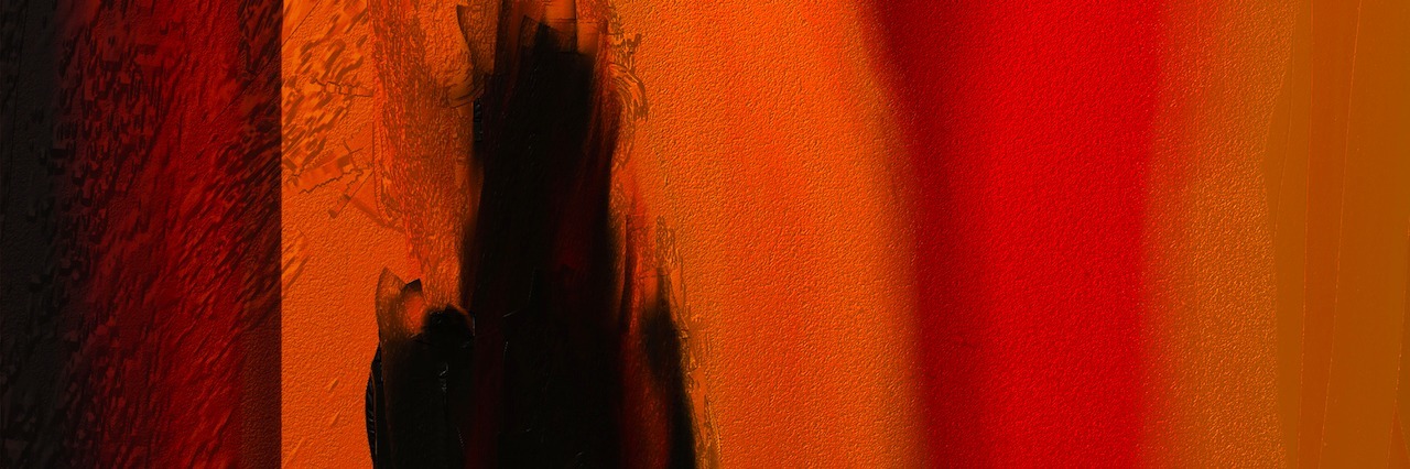 A blurry dark figure of a person