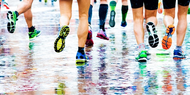 My Life With Illness Is Like Running the Boston Marathon While Sick. But I'm Winning. people running in a marathon on a wetted surface