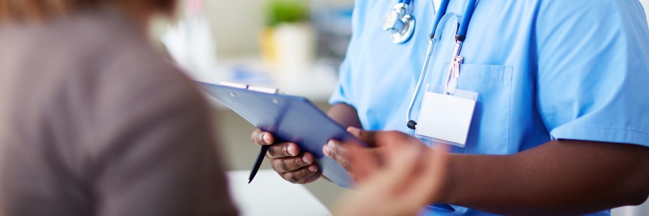 My Thank-You to the Doctors Who Didn't Support Me doctor working with patient in his office