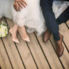 feet of bride and groom, wedding shoes (soft focus). Cross processed image for vintage lookfeet of bride and groom, wedding shoes (soft focus)