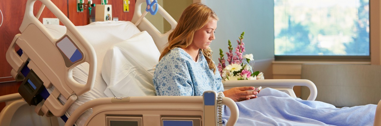 You Know You're a Hospital Kid When... Teenage Female Patient In Hospital Bed Using Cellphone