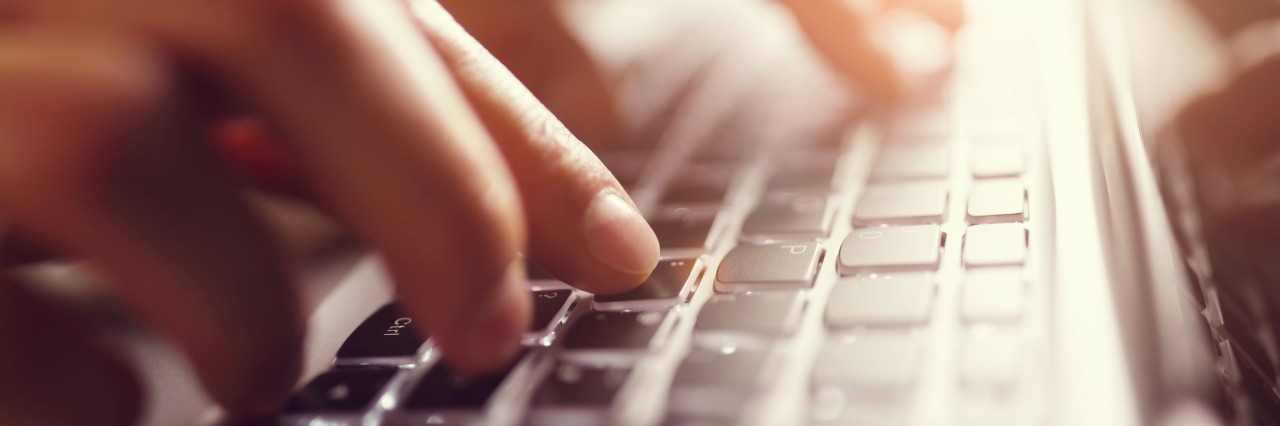 How Social Media Has Helped Me With My CSF Leak fingers typing on laptop