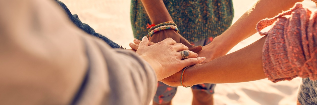 Thank You to Friends Who Stayed and Left After Dysautonomia Friends at the beach putting hands together