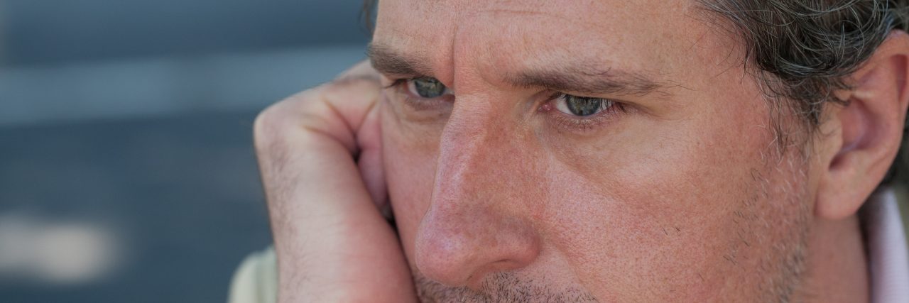 Bipolar Disorder and Losing Friends Portrait of confident professional man in deep thought