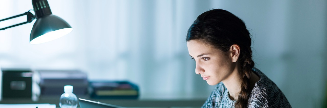 To My Teachers, From Your Student With Ehlers-Danlos Syndrome young student sitting at desk and doing her homework