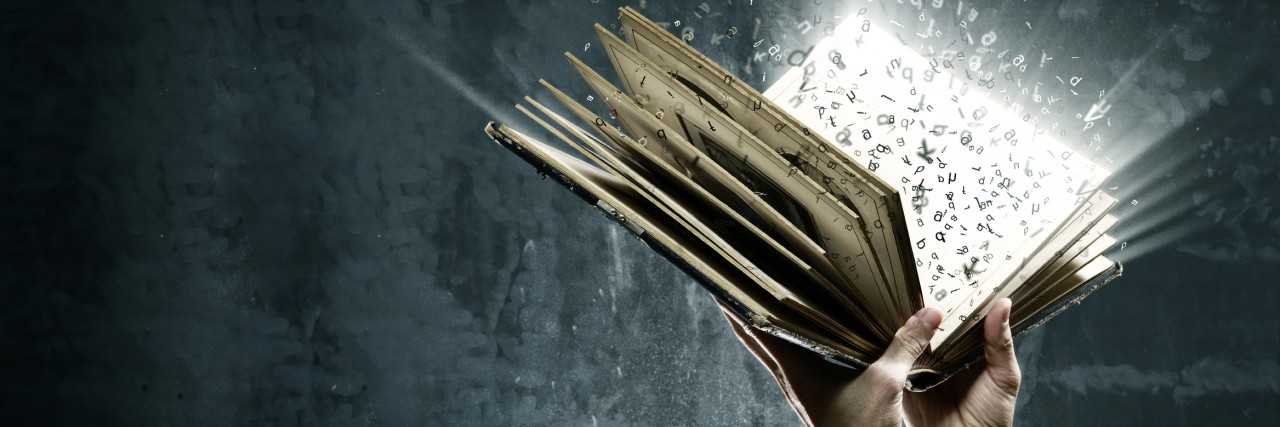 The Insight I Gained in Eating Disorder Recovery Opened magic book with magic lights