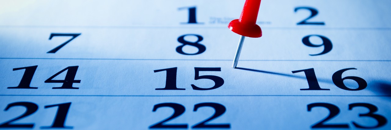 'The Anniversary Effect' or 'Reaction:' What It Is and How to Deal Red pin marking the 15th on a calendar