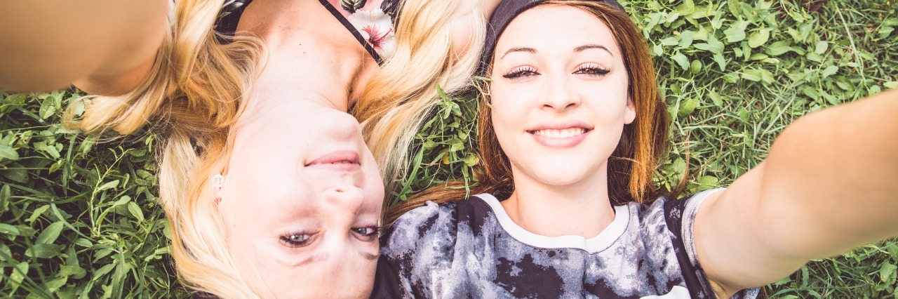 What I Wish I Would Tell My Able-Bodied Friends Two young girls holding camera and taking a selfie