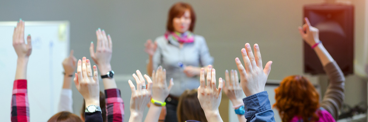 Educating Teachers Not to Say the R-Word Teacher with students.