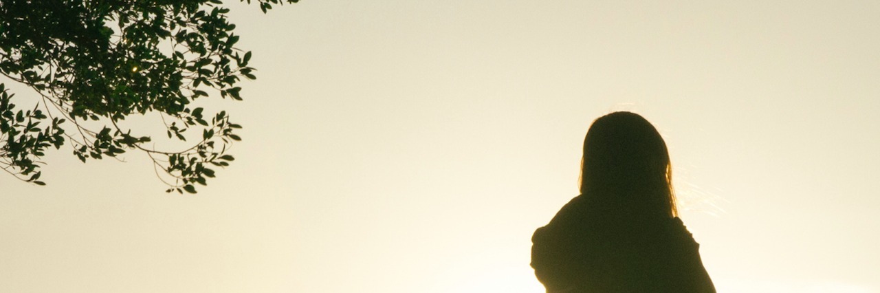 Memories After Losing My Mom and My Son Woman standing near tree against bright sky at sunset