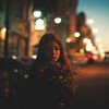 woman is walking alone on the night street