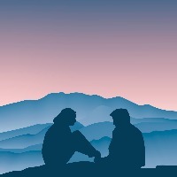 Couple face to face, side view, silhouette in front of a mountain at sunset.