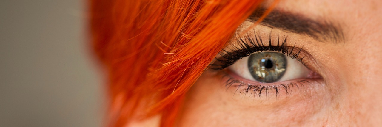 Close up shot of woman eye looking at camera