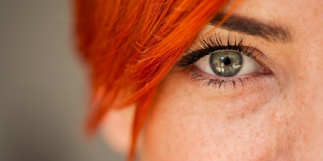 Close up shot of woman eye looking at camera
