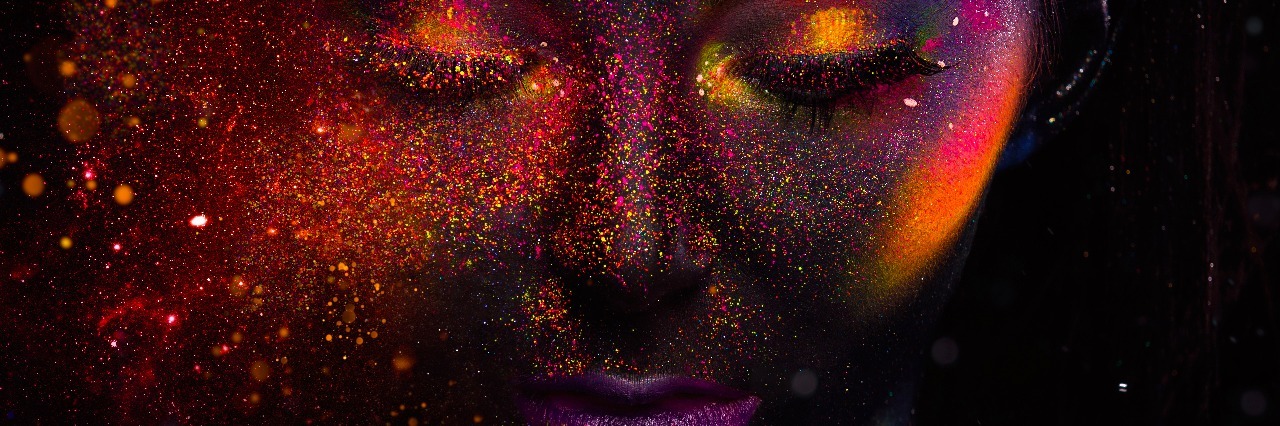 How Hypothyroidism Affects My Energy and What I Can Do Bright neon make-up, creative body art on the theme of space and stars