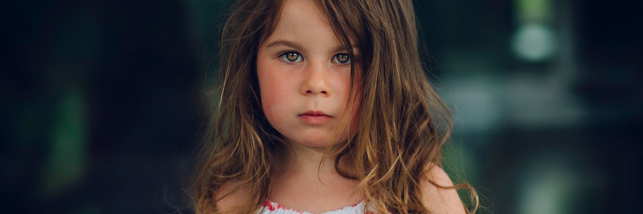 How I Knew I Grew Up With Social Anxiety young girl staring forward