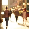 Blurred background of people walking on street in city