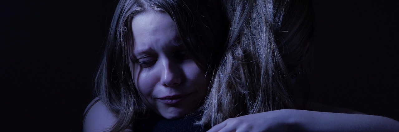 The Shame We May Feel for Having a Mental Illness Sad teenager daugher and her loving mother.