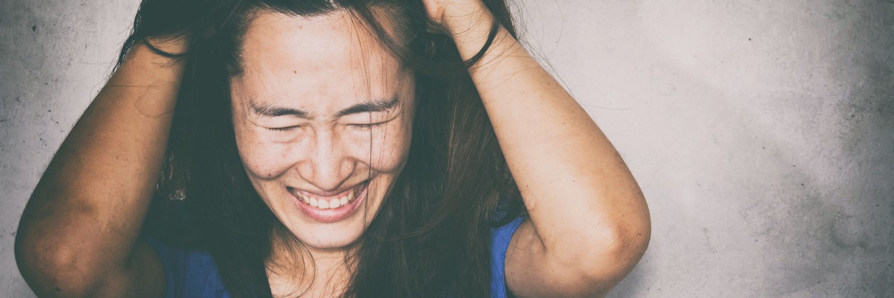 The Difference Between Anxiety and Stress woman stressed out