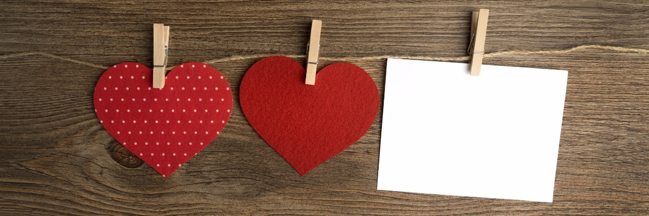cards on the wooden background, A Valentine's Day card decorated with hearts. Love.