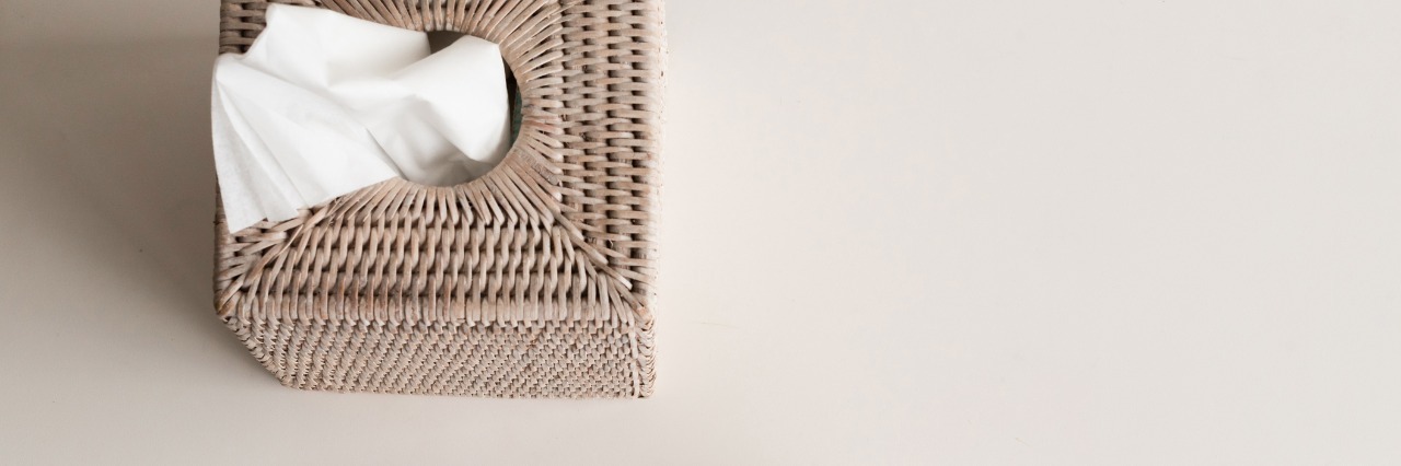 What It's Like to 'Feel Alive' in Eating Disorder Recovery tissue box with two used tissues beside it