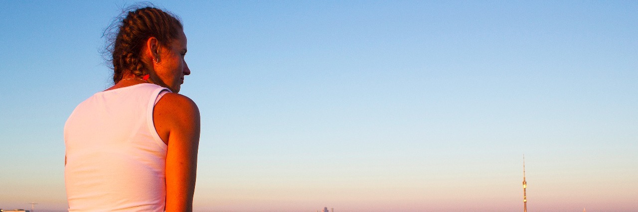 How I Can Help End the Mental Health Stigma as a Teen Girl posing on the roof of tall buildings