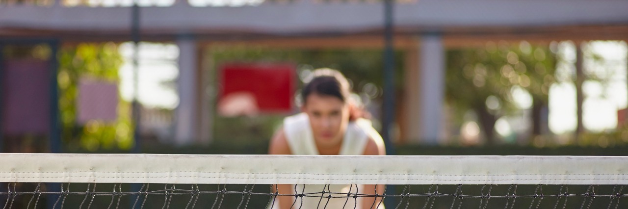 Starting to Working Out Again in Eating Disorder Recovery woman playing tennis