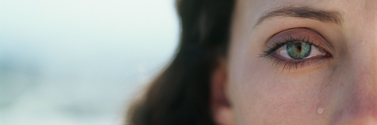 Parents: When You're in Pain, It's OK to Cry in Front of Your Children Young woman crying,portrait,close-up (cropped)