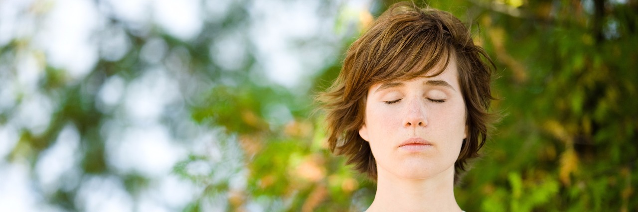 Why I'm Going to Stop Making Suicide/Death Jokes Woman meditating outdoors