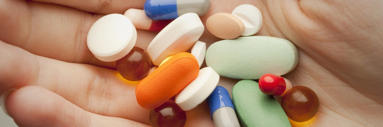 Why Antidepressants Are Not 'Happy Pills' Pills on a person's palm