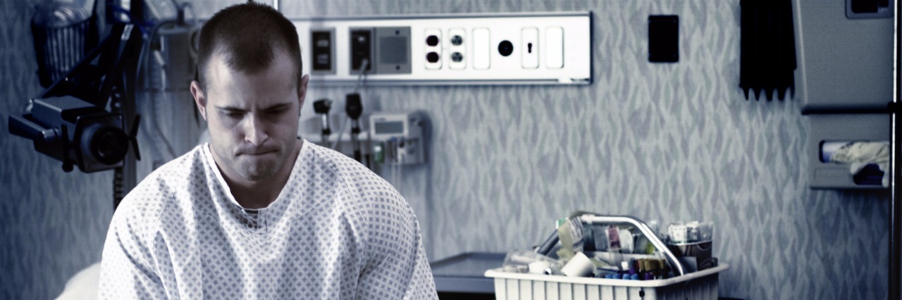 Living Someone With Borderline Personality Disorder lifestyle photo of a young caucasian man as he waits in a hospital examination room